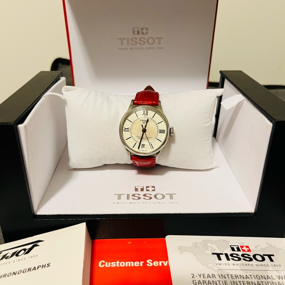SOLD- Tissot Watch with Red Strap and White Dial